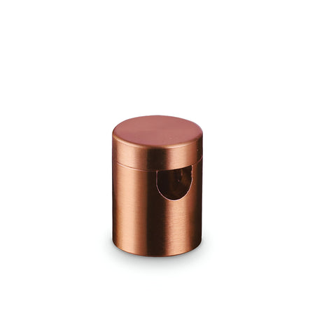 The Sparion Small Cable Holder - Copper is a cylindrical desk accessory with a smooth finish and an open slot in the middle, seamlessly blending style and function against a plain white background.