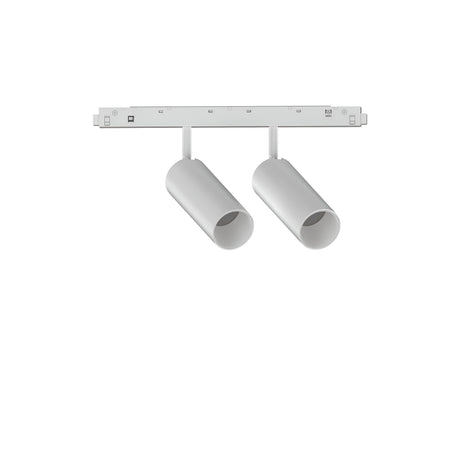 A minimalist ceiling-mounted fixture called the Luxeon Dimmable LED Magnetic Twin Track Spotlight features two sleek, cylindrical, and dimmable 24W LED lights in a modern white finish, arranged on a rectangular base. Each energy-efficient light is adjustable, perfect for contemporary interiors. The fixture is displayed against a plain white background.