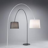 Two Lucidia Floor Lamp Arms in modern style, one in black and one in white. The black lamp is complemented by a dark lampshade, and the white lamp contrasts with a light-colored shade. Both lamps feature adjustable elements that enhance their contemporary design, all showcased against a simple gray background.