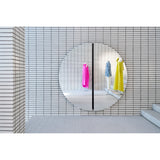 Luna Black Two Piece Round Wall Mirror 200cm, a large frameless round mirror in two halves with a black lacquered glass strip at the centre join, shown on a white tiled wall.