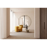 Luna Black Two Piece Round Wall Mirror 200cm with a black lacquered glass centre joint, shown in a neutral hallway beside a mustard armchair and coffee table.