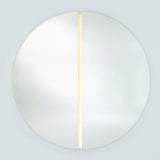 The lit round mirror seen larger, the strip running the full height of the channel that separates the halves.