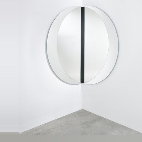 Luna Black Two Piece Corner Wall Mirror 150cm, a round frameless mirror split into two halves mounted across a room corner with a black lacquered glass strip at the join.