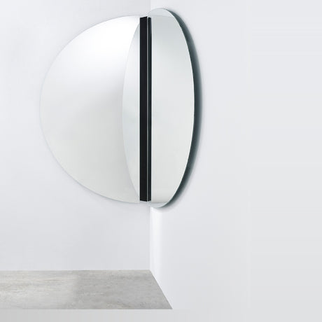 Luna Black Two Piece Corner Wall Mirror 150cm, a round frameless glass mirror split into two halves mounted at a corner angle, joined by a black lacquered strip.