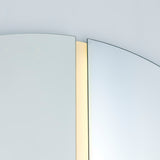 Close-up of the Luna Light LED Two Piece Square Wall Mirror, showing frameless glass panes with a vertical LED strip glowing between them against a light background.