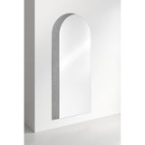 Orient Silver Leaf Arch Full Length Mirror 180cm, a frameless arched wall mirror with straight sides curving into a rounded top, leaning against a white wall in a plain room.
