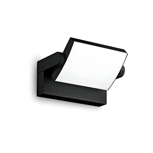 Introducing the Solstice LED Outdoor Wall Light 20.5W 3000K - Black, which showcases a sleek and minimalist black design complemented by a rectangular white panel. This modern light features an adjustable diffuser angled gently downward and boasts an IP54 rating, ensuring durability against the elements when set against a plain white background.