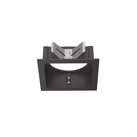 From the front, the Voltis Square Frame 80mm - Black showcases a sleek square black recessed light fixture with a central metallic component. It's part of a versatile modular lighting system, encased in a rectangular frame featuring clean lines and minimalist design.
