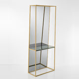 Chassis XL Deluxe free standing mirror in an open gold metal frame, 170cm high, with a green marble shelf set horizontally and a mirrored back panel, on a plain light background.