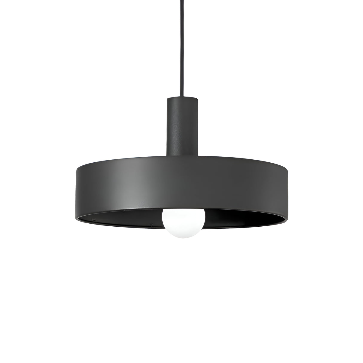 The Arion 1 Light Pendant - Black showcases a contemporary design with a sleek black circular shade and an exposed white bulb. This dimmable fixture hangs from a dark cord and includes an E27 bulb holder, creating a minimalist aesthetic.