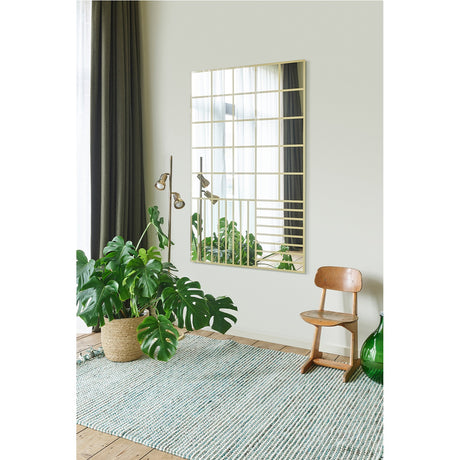 Grid Gold Window Print Full Length Mirror 158cm with gold grid pattern glass, mounted on a wall above a wooden chair, rug, and potted plant in a living room setting.