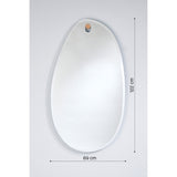 Frameless Globo Lago wall mirror in an irregular organic shape with bevelled edge, hung from a single oak peg, shown with dimensions 122cm by 69cm on a light background.