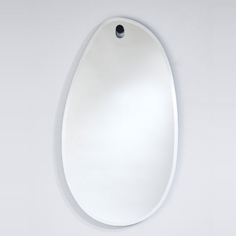 The peg hung mirror seen larger, the dark oak peg holding it clear of the wall at the top of the glass.