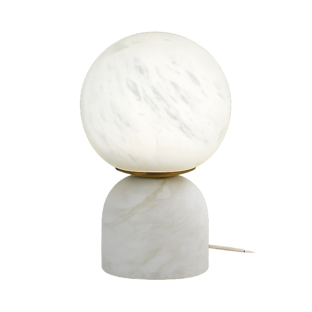 The Solvyn LED Large Globe Alabaster Table Lamp - Soft White features a round, frosted glass globe set on a cylindrical white marble base and includes a power cord.