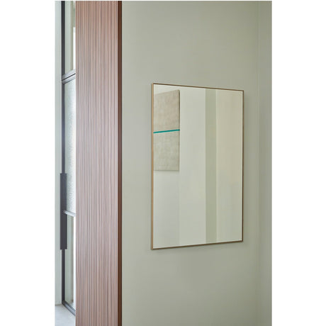 Lucka Solid Oak Full Length Mirror 175cm in a slim wood frame, hung on a light grey hallway wall reflecting a striped canvas artwork.