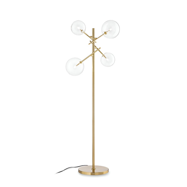 Introducing the Solarae Floor Lamp - Brass: a modern masterpiece with an elegant antique brass finish and asymmetrical blown glass diffusers on its sleek stand. The design features a circular base and a discreet black power cord, combining style with functionality.
