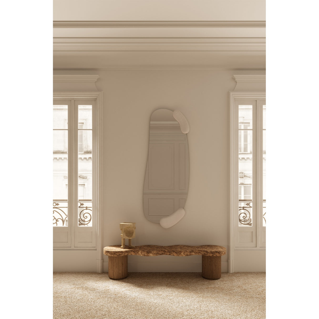 Calco Sculpted Full Length Wall Mirror 166cm in white, with an irregular arched glass and two moulded white forms at top and bottom, shown mounted in a hallway above a wooden bench.