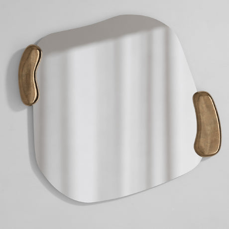 Calco Gold Leaf Sculpted Wall Mirror 116cm with an irregular frameless glass panel and two organic gold leaf handle-like forms at the edges, shown on a plain white background.