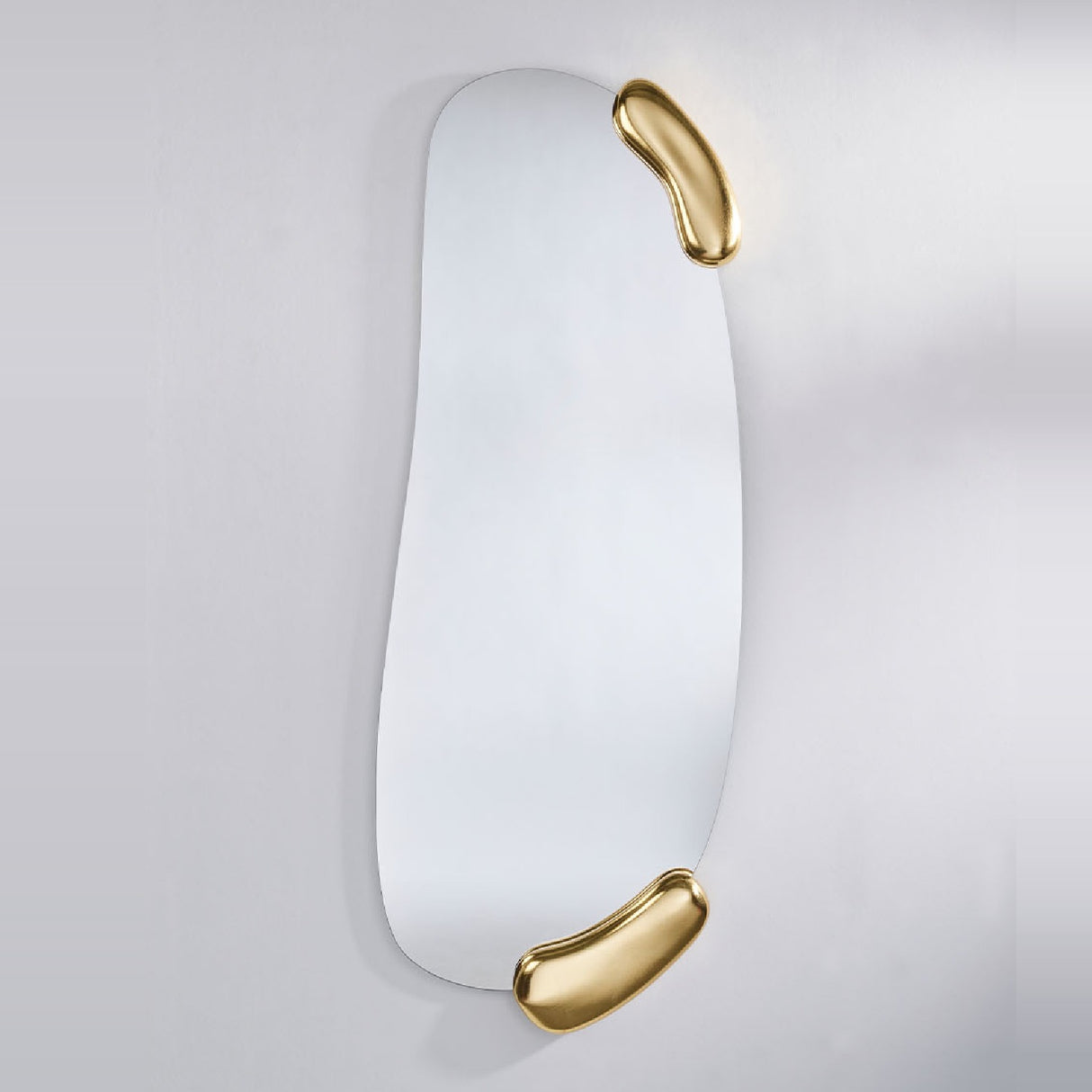 Calco Gold Leaf Sculpted Hall Mirror, 166cm tall wall mirror with an irregular oval frame, featuring sculpted gold-leaf accents at the top and bottom corners, shown against a plain light background.