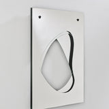 Infinito Precision Cut Void Wall Mirror 100cm, a rectangular white panel with an organic cut-out void revealing layered mirrors set behind the surface, shown at an angle against a plain wall.