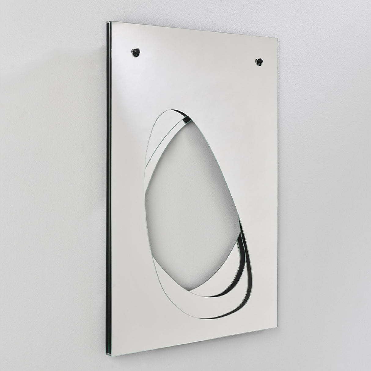 Infinito Precision Cut Void Wall Mirror 100cm, rectangular frameless design with an organic cut-out void revealing layered mirrors, shown at an angle on a white panel against a plain background.
