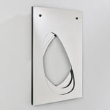 Infinito Precision Cut Void Wall Mirror 100cm, rectangular frameless design with an organic cut-out void revealing layered mirrors, shown at an angle on a white panel against a plain background.