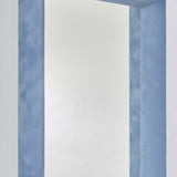 Close-up of the Velvet Blue Framed Rectangular Wall Mirror, 150cm, showing the deep box frame in dusty blue velvet with the recessed glass and shaded inner return.