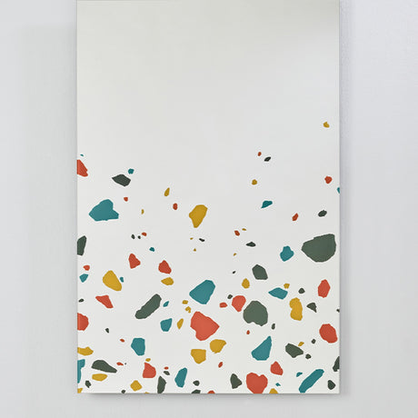 Frameless rectangular glass wall mirror, 120cm, with red, teal, ochre and grey terrazzo print along the lower edge and a plain mirror surface above.
