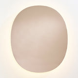 Brio Bronze backlit LED oval wall mirror, 106cm, bronze-tinted glass with a warm LED halo washing onto the wall behind it.