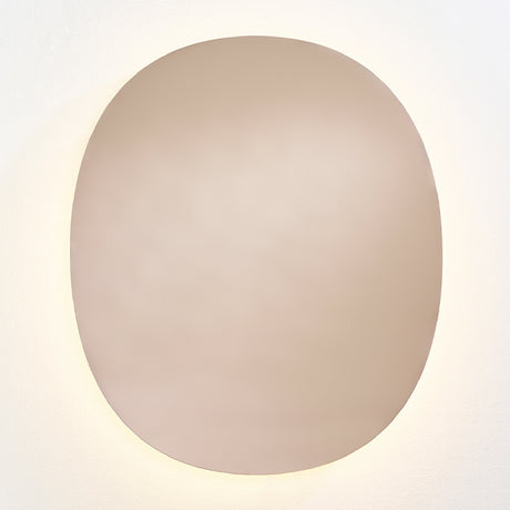 Brio Bronze backlit LED oval wall mirror, 106cm, bronze-tinted glass with a warm LED halo washing onto the wall behind it.