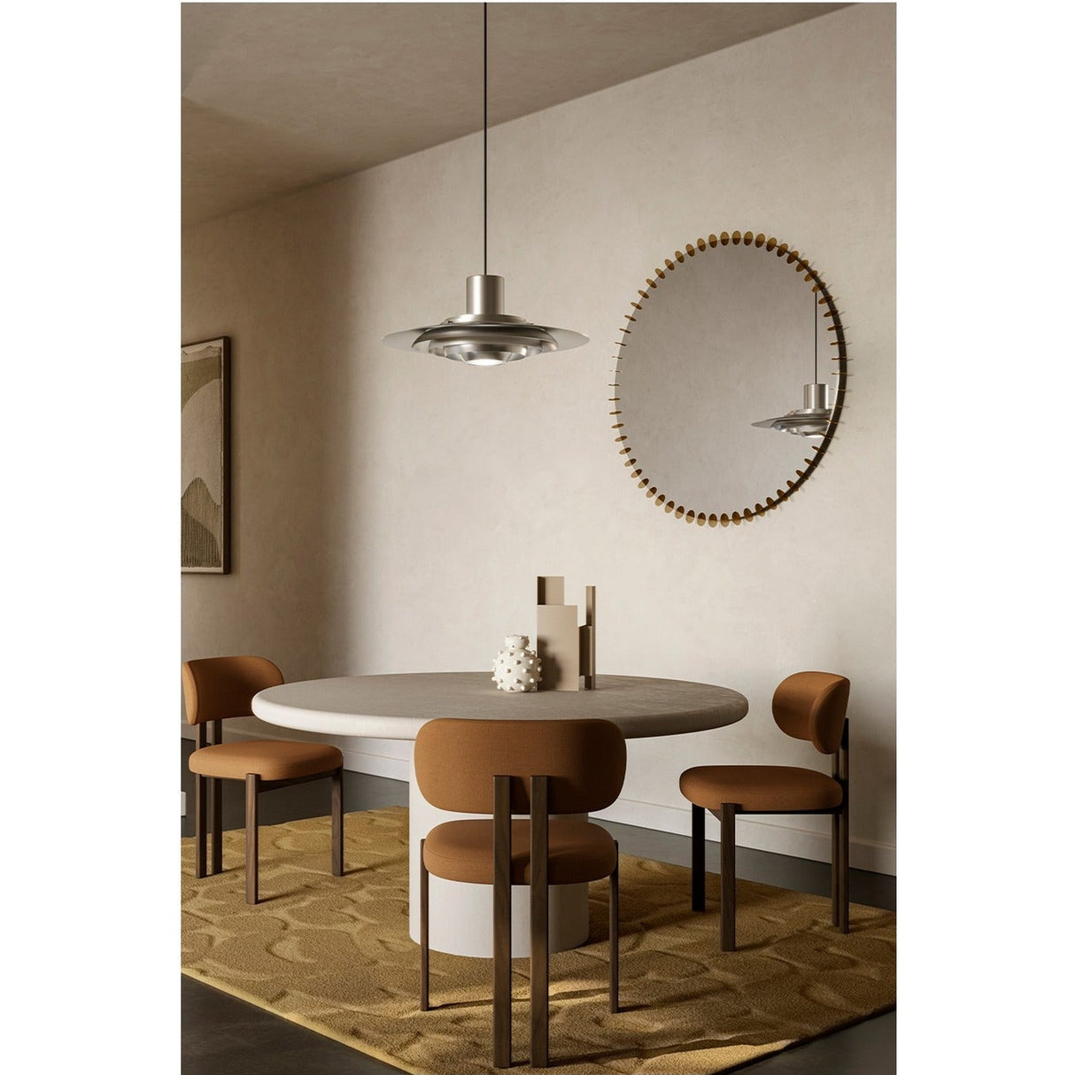 Ray round wall mirror, 105cm, with gold powder-coated metal discs ringing the edge, hung above a dining table in a neutral-toned dining room.