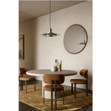Ray round wall mirror, 105cm, with gold powder-coated metal discs ringing the edge, hung above a dining table in a neutral-toned dining room.