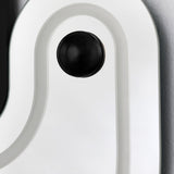 Close-up of a sphere seated on its raised track, the white moulded surround curving closely around it.