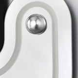 Close-up of the Satellite Silver Leaf Engraved Orbit Wall Mirror, showing a silver metal leaf sphere set into an engraved curved path on the mirrored surface.