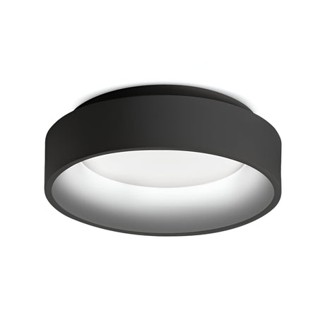 Introducing the Fluxis LED Flush Ceiling Light - Black, 30cm. This contemporary black fixture boasts a circular design and a smooth minimalist aesthetic. Its energy-efficient qualities are highlighted by a wide black rim that gracefully encases the white circular light source, offering a sleek and versatile addition to any interior setting.