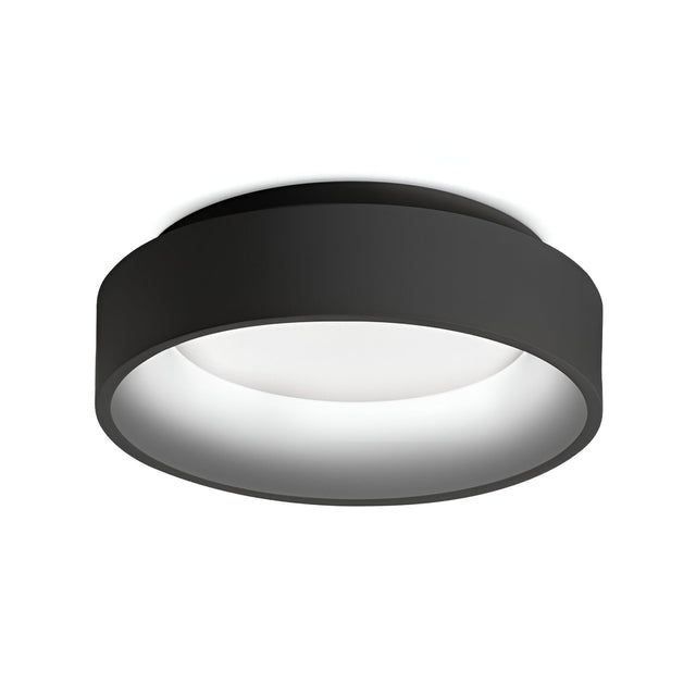 Introducing the Fluxis LED Flush Ceiling Light - Black, 30cm. This contemporary black fixture boasts a circular design and a smooth minimalist aesthetic. Its energy-efficient qualities are highlighted by a wide black rim that gracefully encases the white circular light source, offering a sleek and versatile addition to any interior setting.