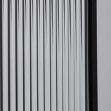 Close-up of the strips seen off axis, the black bands widening as the layers separate across the glass.