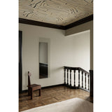 Void Hall Partly Silvered Wall Mirror 175cm, frameless rectangular glass mirror mounted on a light wall above a dark wood chair in a hallway with staircase.