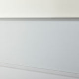 Close-up of the Void Hall Partly Silvered Wall Mirror 175cm, showing the frameless glass edge where the clear border meets the wall in a soft grey hallway setting.