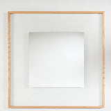 Passepartout Solid Oak Square Wall Mirror 105cm with a slim square oak frame and an offset mirrored glass panel that fades toward clear edges, on a plain white background.