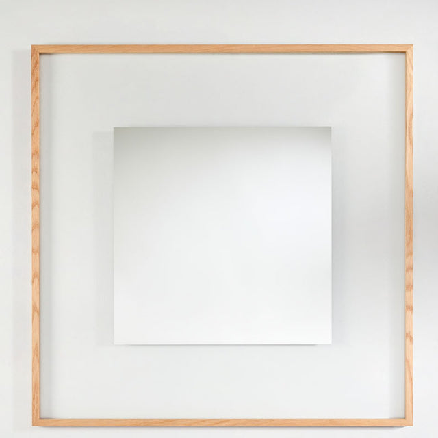 Passepartout Solid Oak Square Wall Mirror 105cm with a slim square oak frame and an offset mirrored glass panel that fades toward clear edges, on a plain white background.