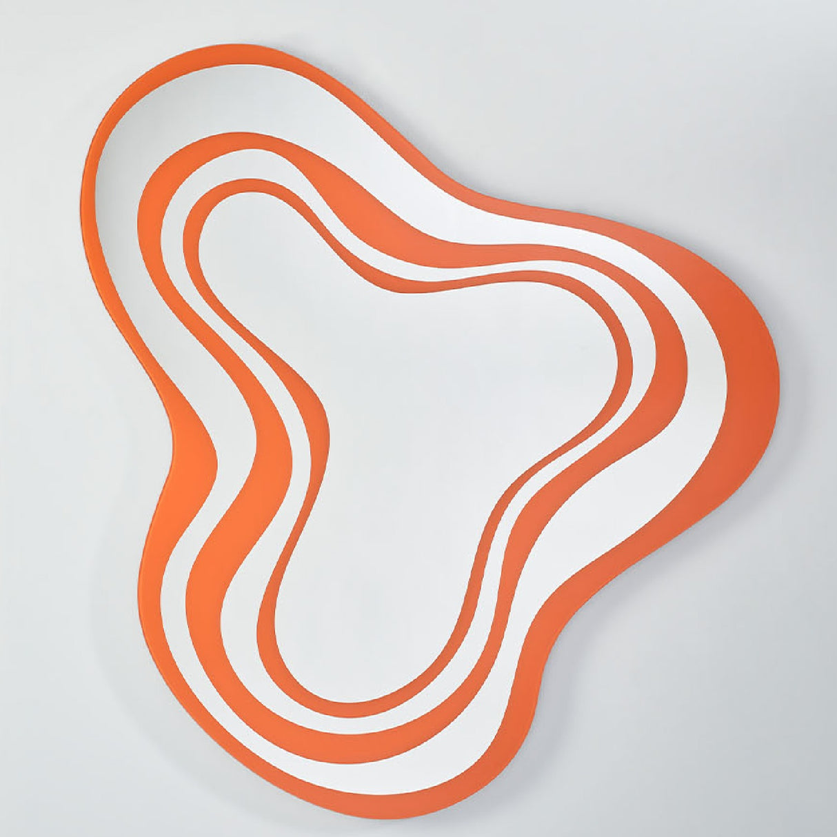 The banded mirror seen larger, four orange bands running in from the edge before the plain centre opens.