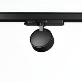 A Helionis LED Track Round Spotlight 22W 3000K in black, mounted on a sleek black rail and viewed from below against a light gray background. The energy-efficient, cylindrical light head is adjustable, designed to focus illumination in various directions.