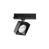 The Helionis LED Track Square Spotlight 22W 3000K in black, with its square shape and adjustable head, features a round bulb at the center mounted on a horizontal track connector. Its modern design, enhanced by integrated LED technology, is ideal for illuminating specific areas in a room.