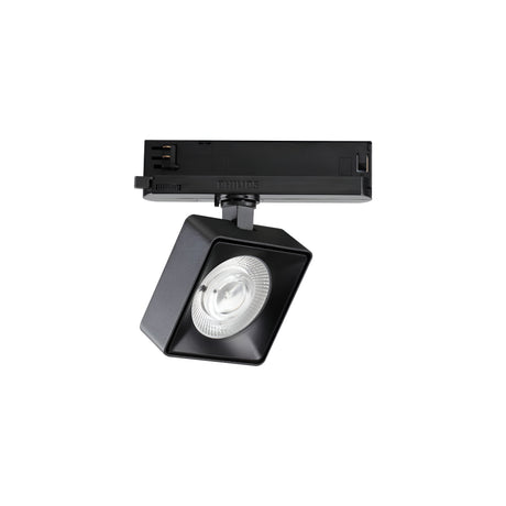 The Helionis LED Track Square Spotlight 22W 3000K in black, with its square shape and adjustable head, features a round bulb at the center mounted on a horizontal track connector. Its modern design, enhanced by integrated LED technology, is ideal for illuminating specific areas in a room.