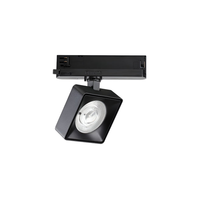 The Helionis LED Track Square Spotlight 22W 3000K in black, with its square shape and adjustable head, features a round bulb at the center mounted on a horizontal track connector. Its modern design, enhanced by integrated LED technology, is ideal for illuminating specific areas in a room.