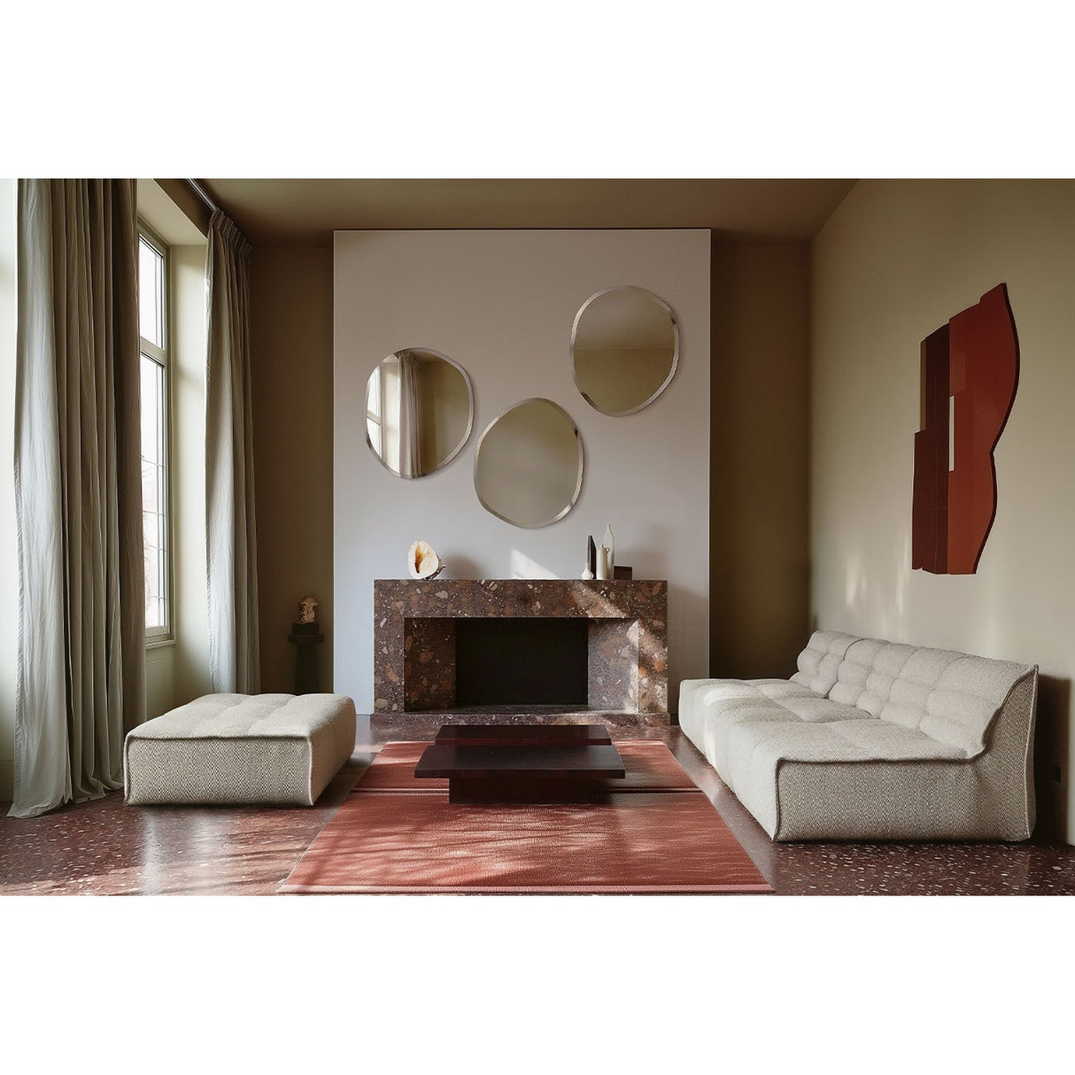 Pure Bevelled Edge Organic Wall Mirror 78cm, frameless irregular pebble-shaped mirrors with wide bevelled edge, shown grouped above a marble fireplace in a living room.