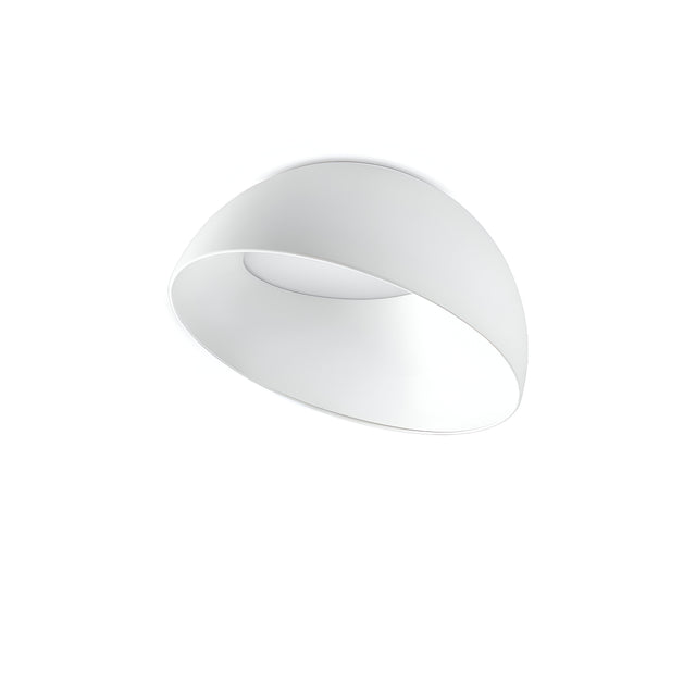 Presenting the Lucidus-2 LED Flush Ceiling Light in a sleek, modern minimalist design with smooth curves. This energy-efficient fixture boasts a refined white finish, providing a soft, even illumination when mounted on a white ceiling, blending effortlessly with its surroundings.