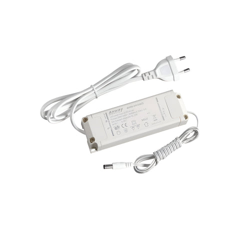 A Nocturne Constant Voltage LED Driver - 25W, 24V with a European plug and a long, coiled cable is shown against a plain background. The white adapter features printed specifications and symbols on its surface, ensuring constant voltage for reliable performance.