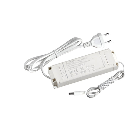 The image showcases the Nocturne Constant Voltage LED Driver - 40W, 24V with a European plug. It features several label markings and technical specifications, including constant voltage output, printed on its surface. A coiled cable extends from one end, indicating its function as an LED driver.